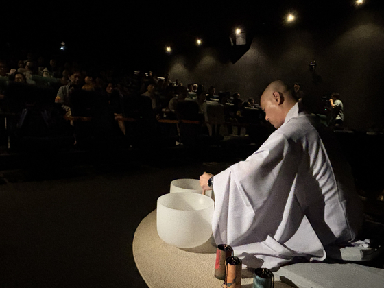 Popcorn out, prayers in: A movie theater in Seoul becomes a Buddhist temple